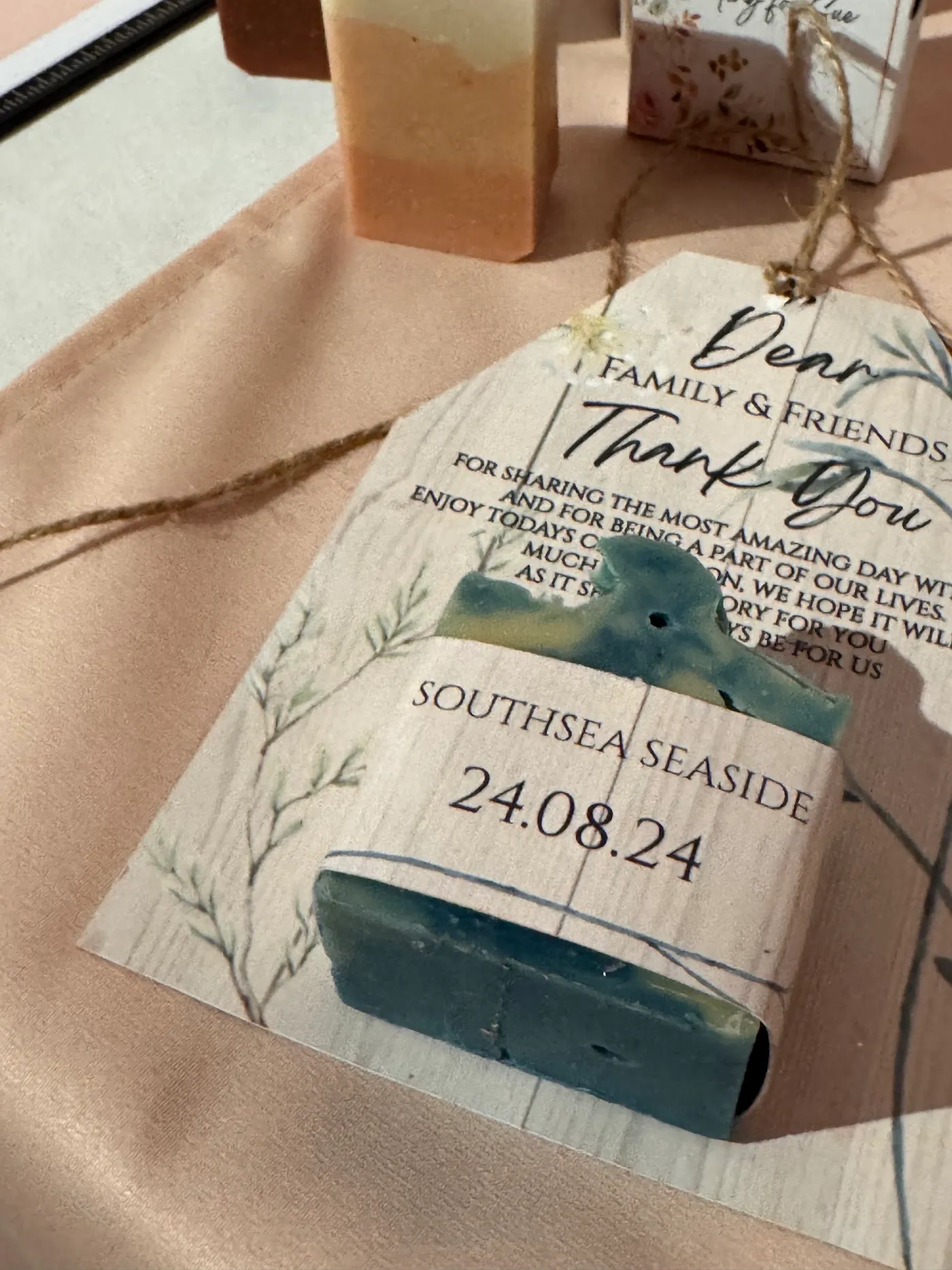 Wedding favour soap with a personalised name and date tag